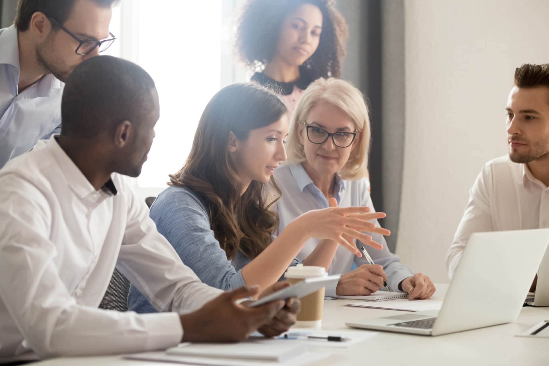 An employee holds a meeting to discuss Managed IT Service.